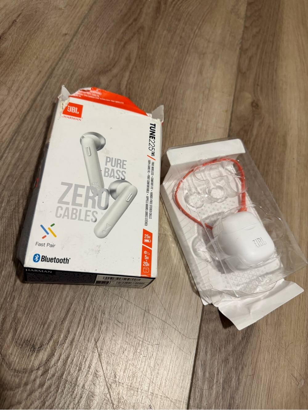 JBL White Wireless Earbuds with Orange Accent Charging Cable